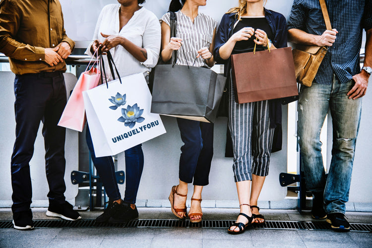 group of people with shopping bag uniquelyforu logo