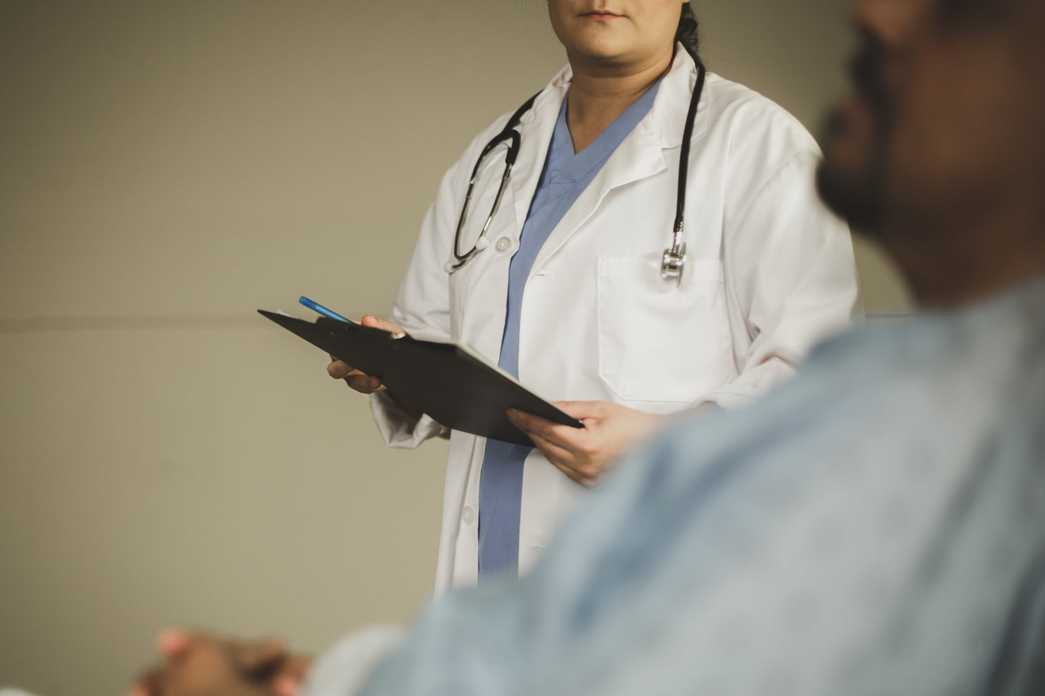 female doctor holding medical chart